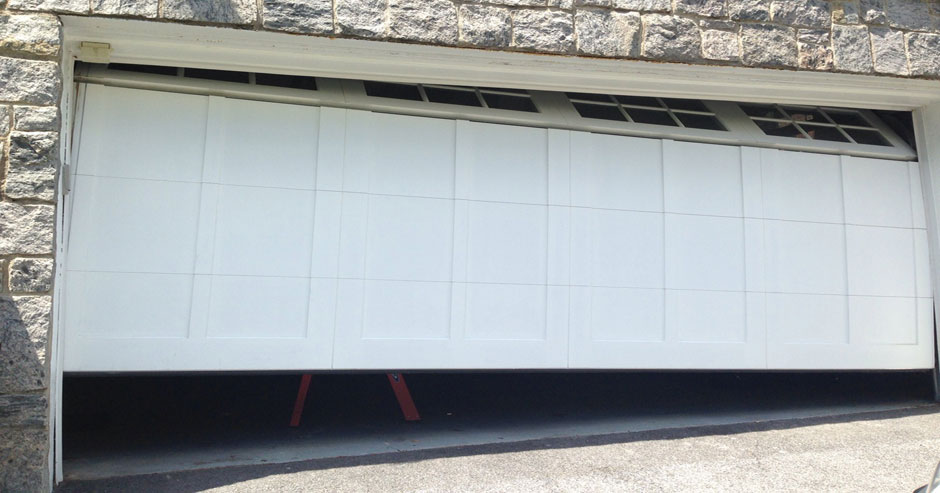 Broken garage door repairs Menomonee Falls